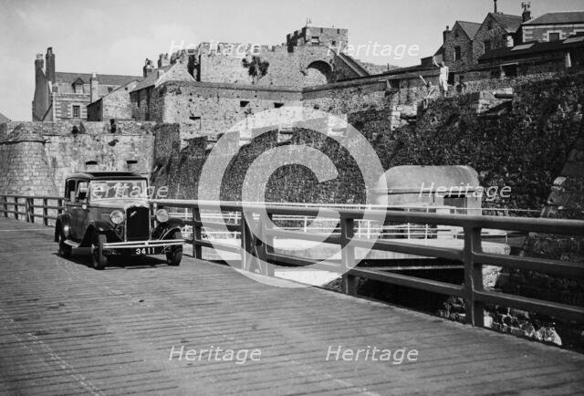 1932 Austin 12/4 saloon, Castle Cornet, St Peter Port, Guernsey, Channel Islands. Creator: Unknown.