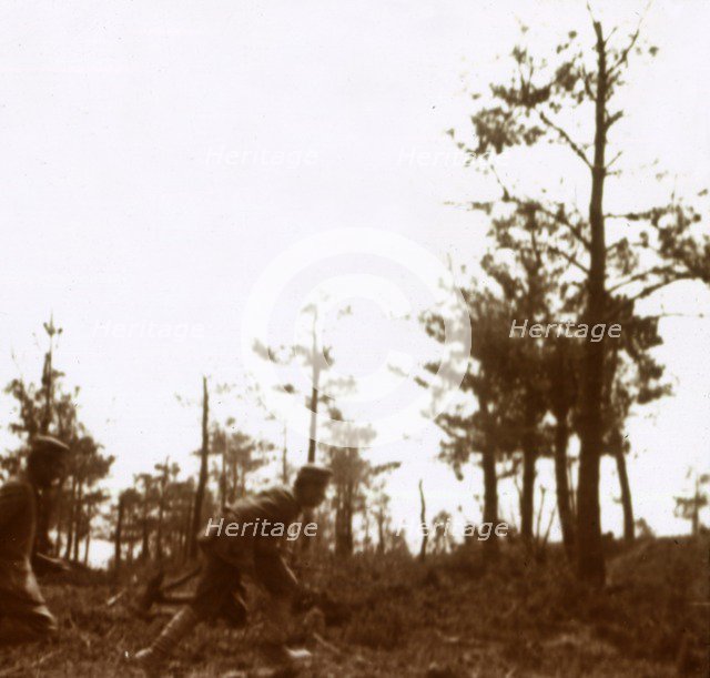 Soldiers running on the battlefield, c1914-c1918. Artist: Unknown.