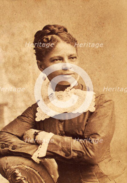Half--length portrait of unidentified woman wearing wide lace collar, c1880-c1889. Creator: Richmond Photograph Co.