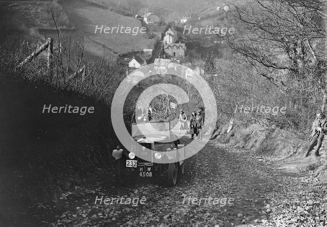 Singer Junior of RW Everard competing in the MCC Lands End Trial, Beggars Roost, Devon, 1929. Artist: Bill Brunell.