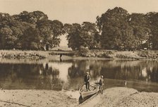 'London's River at Isleworth Ferry Looking Towards the Green Glades of Kew Gardens', c1935. Creator: Donald McLeish.