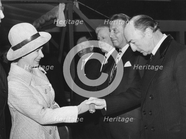 Queen Elizabeth meets John Profumo at Attlee House, London, 18th November 1971. Artist: Unknown