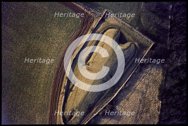 Belas Knap, a Neolithic chambered long barrow, Winchcombe, Gloucestershire, 1971. Creator: Jim Hancock.