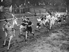 Running the half mile at the Civil Service Sports day, Stamford Bridge, London, 1926-1927. Artist: Unknown