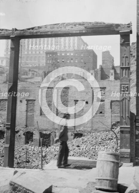 After the fire, 1906 (the Fairmount Hotel in the distance), Chinatown, San Francisco, 1906 Apr. Creator: Arnold Genthe.