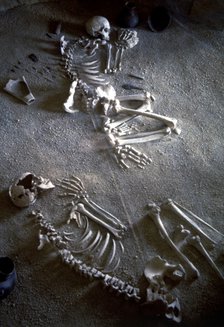 Collective burial, necropolis Ponte San Pietro (Lazio), detail of two adult skeletons of a man an…