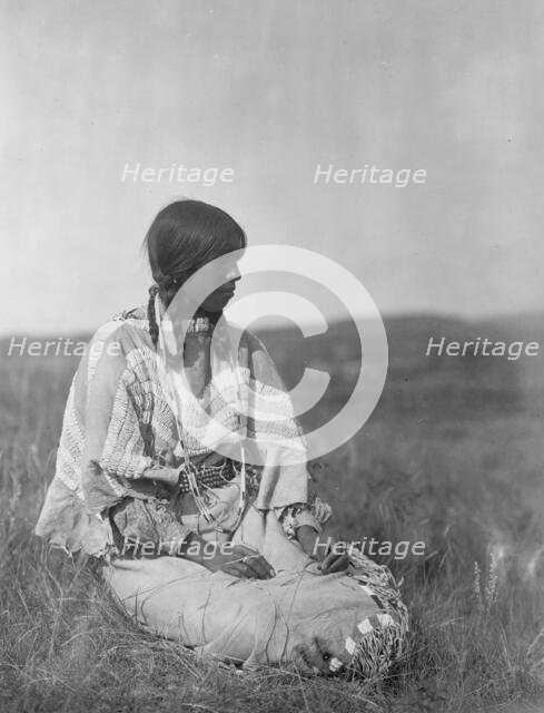 Flint Smoker's daughter, c1910. Creator: Edward Sheriff Curtis.