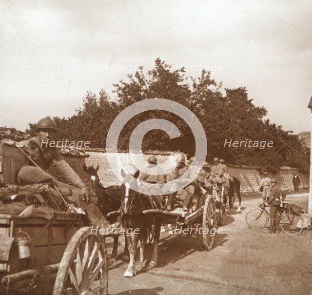 Troops in horse-drawn carts, Raux, France, c1914-c1918. Artist: Unknown.