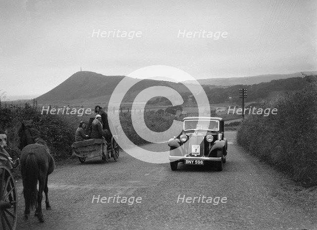Armstrong-Siddeley saloon of FN Morgan competing in the South Wales Auto Club Welsh Rally, 1937 Artist: Bill Brunell.