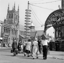 Holidaymakers make their way towards Talbot Road Station, Blackpool, c1946-c1955. Artist: John Gay