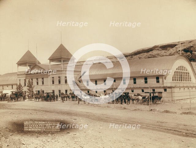 Hot Springs, SD Exterior view of largest plunge bath house in US on FE and MV R'y, 1891. Creator: John C. H. Grabill.