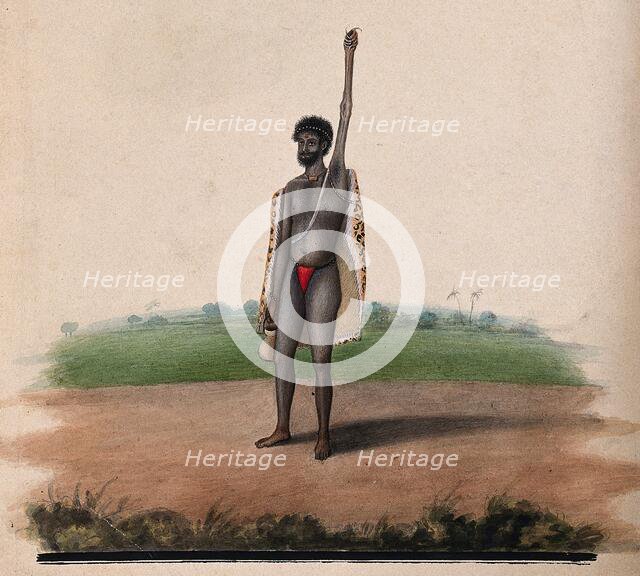 A Hindu ascetic or holy man: standing, with withered left arm raised over his head, and..., 1880. Creator: Unknown.