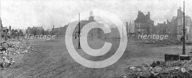 ''La Destruction de Cambrai; Dans Cambrai devaste et livre aux flammes; la place d'Armes..., 1918. Creator: Unknown.