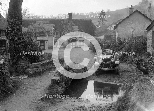 Kitty Brunell driving a Ford Model A 2-seater, Winsford, Somerset, 1930s. Artist: Bill Brunell.