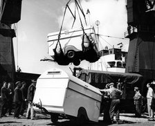 Unloading trailers from a ship, (c1950s?). Artist: Unknown