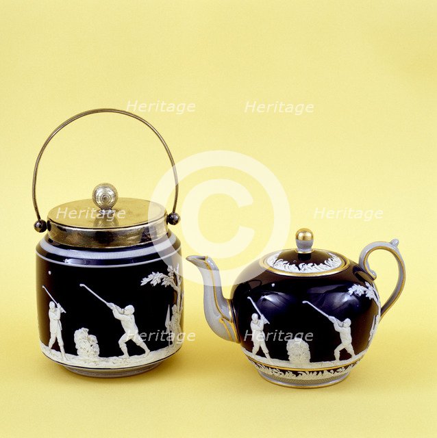 Copeland Spode biscuit barrel and teapot decorated with images of golfers, c1905. Artist: Copeland Spode