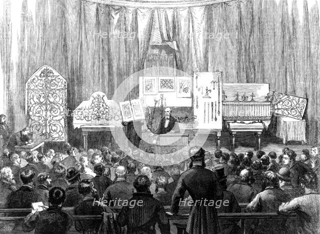 Lecture to working men on ornamental ironwork at the South Kensington Museum, 1870. Creator: D H F.