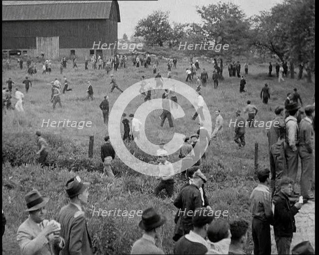 A Crowd of Angry Civilians Clashing With the US Army, 1932. Creator: British Pathe Ltd.
