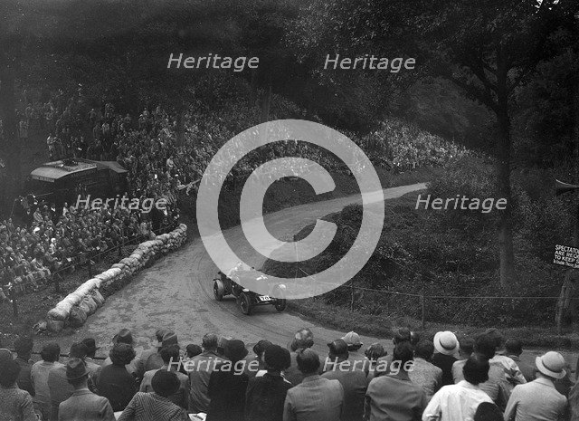 Alvis competing in the Shelsley Walsh Hillclimb, Worcestershire, 1935. Artist: Bill Brunell.
