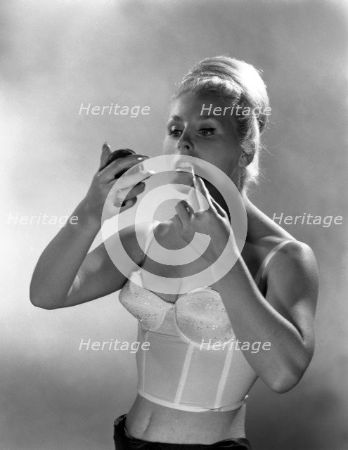 Advertising image for Truline bras, 1963.  Artist: Michael Walters