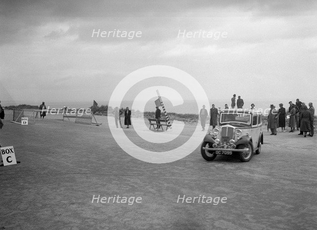 Standard Twelve saloon of Mrs SH Richards competing in the RSAC Scottish Rally, 1934. Artist: Bill Brunell.