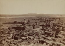 Village of Edfu, View Taken from the Pylon of the Temple, late 19th century. Creator: Henri Bechard.