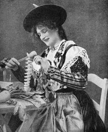 A woman creatively peeling a potato, 1922. Creator: Georg Haeckel.