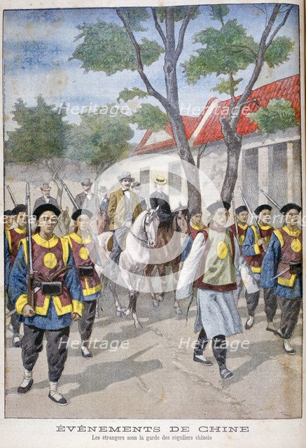 A foreigner under the guard of regular Chinese army, China, 1900.  Artist: Oswaldo Tofani