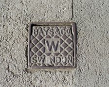 Iron water stop tap cover plate made by Bays and Company, Swindon, Wiltshire, 2006. Artist: Peter Williams.