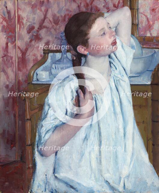 Girl Arranging Her Hair, 1886. Creator: Mary Cassatt.
