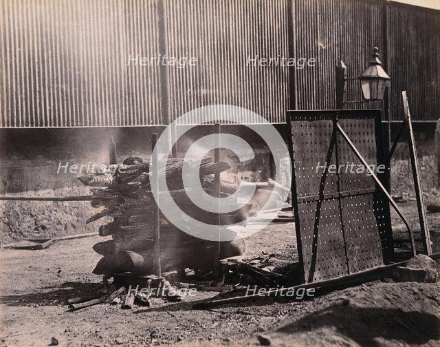 Bombay (Mumbai): a body burning on a funeral pyre, (1900?). Creator: Unknown.