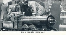 'On a Model Railway', 1925 (1937). Artist: Unknown.