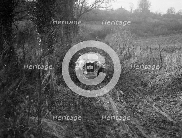 MG M Type of RR Balding competing in the MG Car Club Trial, Kimble Lane, Chilterns, 1931. Artist: Bill Brunell.