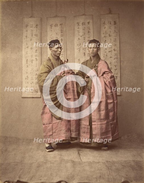[Two Chinese Men in Matching Traditional Dress], 1870s. Creator: Unknown.