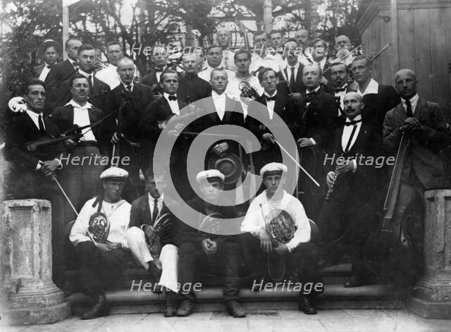 Mikhail Alekseevich Pavlov with the Members of a Symphony Orchestra, 1920s. Creator: Unknown.