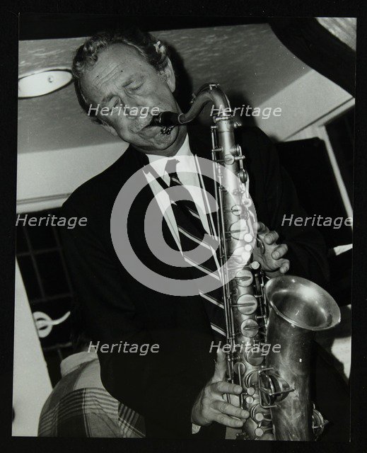 Tenor saxophonist Spike Robinson playing at The Bell, Codicote, Hertfordshire, 11 September 1986. Artist: Denis Williams