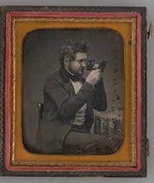 Untitled (Portrait of Man Looking Through a Stereoscope), 1856. Creator: Unknown.