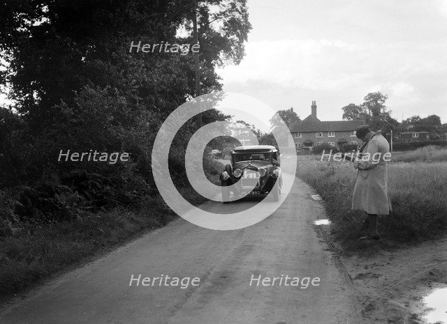 Alfa Romeo taking part in a First Aid Nursing Yeomanry trial or rally, 1931. Artist: Bill Brunell.