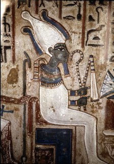 Funerary stela depicting the god Osiris, made in polychromed limestone. From Thebes.