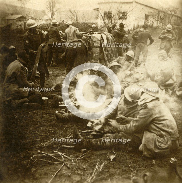 Infantrymen at makeshift kitchen, Cussy farm, Craonne, northern France, c1914-c1918. Artist: Unknown.