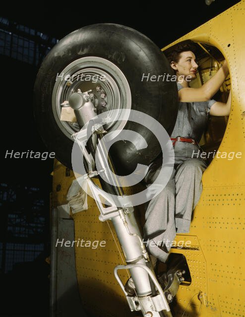 This woman worker at the Vultee-Nashville is shown making..., Nashville, Tenn. , 1943. Creator: Alfred T Palmer.