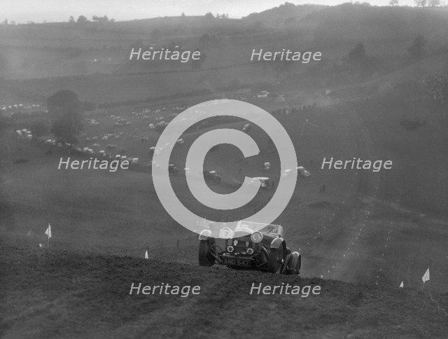 Aston Martin competing in the MG Car Club Rushmere Hillclimb, Shropshire, 1935. Artist: Bill Brunell.