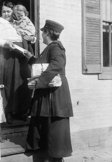 Mrs. Parmlee Campbell, Woman Mail Carrier - Delivering Mail..., 1917 Creator: Harris & Ewing.