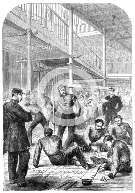 Progress of the International Exhibition Building: marking out space for stalls, 1862. Creator: Unknown.