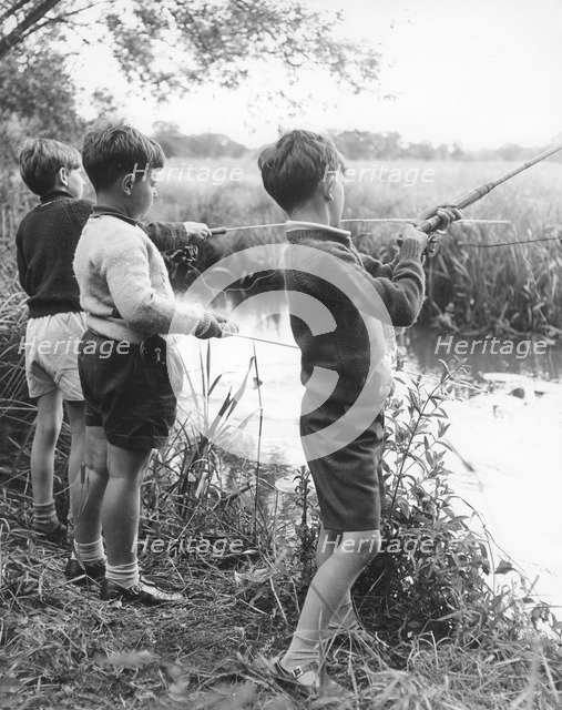 Boys fishing, c1960s.