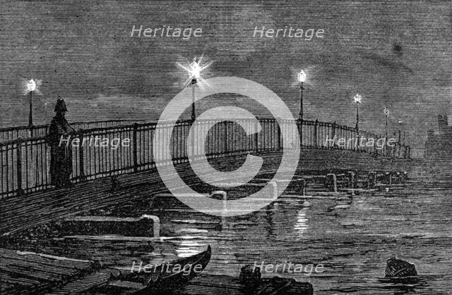 Battersea Bridge during the high tide of Friday last, 1874. Creator: Unknown.