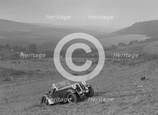 Frazer-Nash BMW 319 competing in the London Motor Club Coventry Cup Trial, Knatts Hill, Kent, 1938. Artist: Bill Brunell.