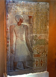 Stela of the Senouret, chief of the royal treasury, with his image and hieroglyphic writing, made…