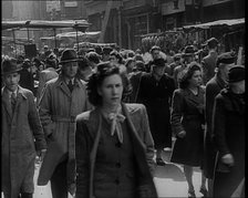 People Moving Along Crowded Streets, 1940. Creator: British Pathe Ltd.