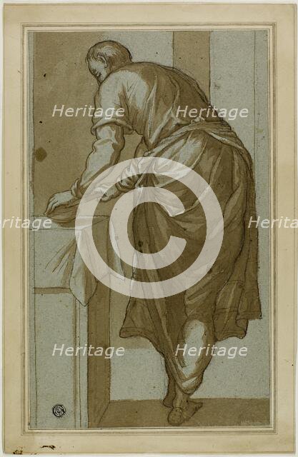 Standing Man Seen From Behind Cutting Bread, n.d. Creator: Unknown.